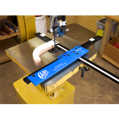 The Circle Cutting Jig from Carter Products installed on a bandsaw, demonstrating its precision setup for safely cutting perfect and consistent wood circles. 